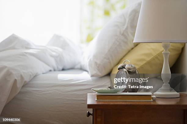 usa, new jersey, jersey city, morning in bedroom - tetra images stock-fotos und bilder