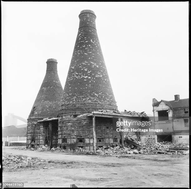 Bottle kilns, Etruria Pottery Works, Stoke-on-Trent, Staffordshire, 1965-1968. Two bottle kilns standing amidst the debris of the Josiah Wedgwood's...