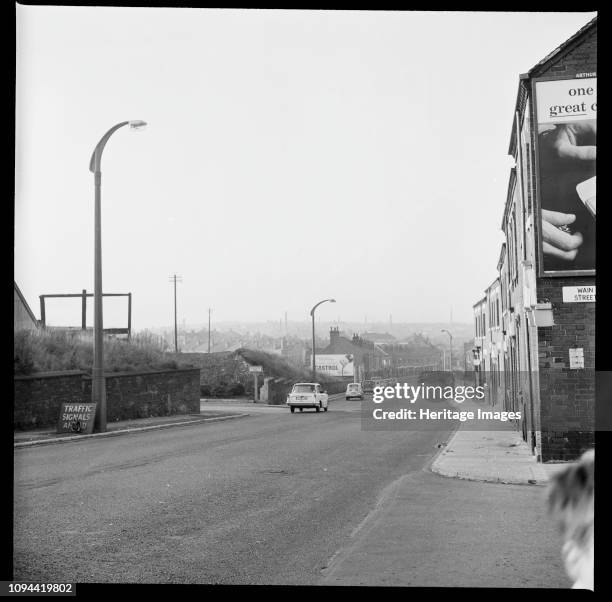 Scotia Road, Burslem, Stoke-on-Trent, Staffordshire, 1965-1968. Looking north along Scotia Road with the entrance to Wain Street visible to the...