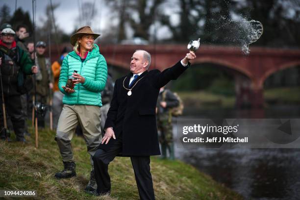 Polly Murray, and Willie Wilson the deputy Lord Provost of Perth, bless the river with whisky as they joined anglers as they attended the opening day...