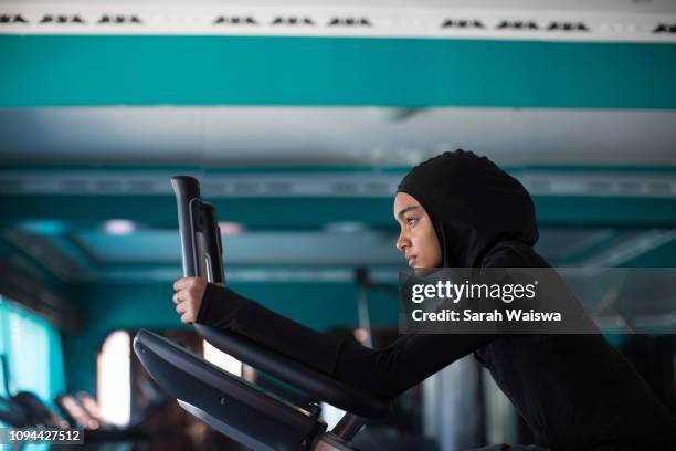 Woman in a hijab working out