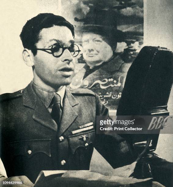 He reads the news in Moroccan Arabic. A member of the Fighting French Army', 1942. From 'Calling All Nations', by T. O. Beachcroft. [The British...