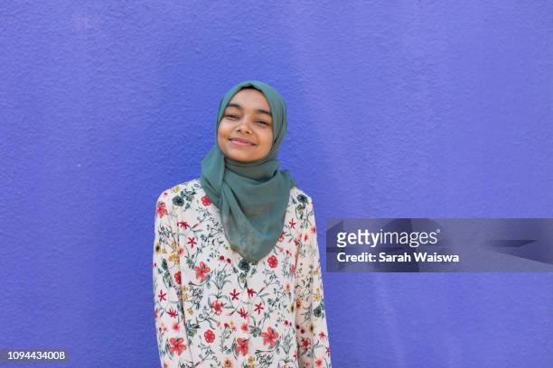 Portrait of a woman in a hijab smiling