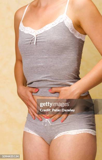 woman with painful tummy - swollen stock pictures, royalty-free photos & images