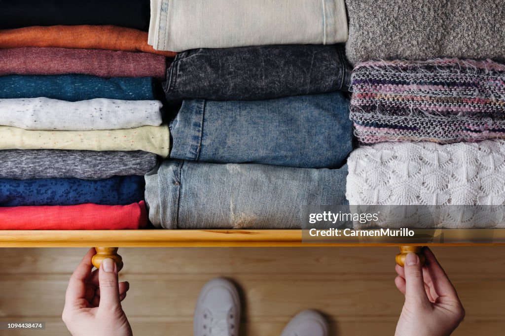 Neatly ordered clothes in drawer