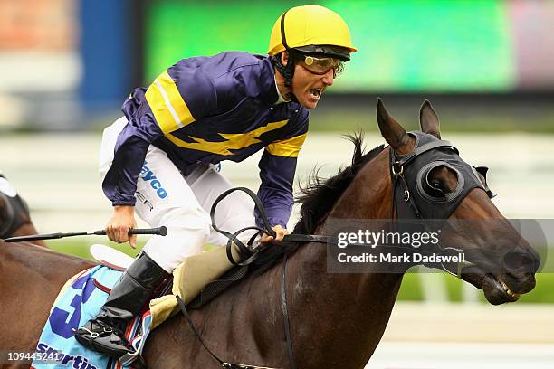 Jockey Damien Oliver riding Eagle Falls wins Race Six the Oakleigh Plate during Blue Diamond Stakes Day at Caulfield Racecourse on February 26, 2011...