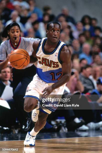 Brevin Knight of the Cleveland Cavaliers handles the ball against the Chicago Bulls on November 11, 1997 at the Quicken Loans Arena in Cleveland, OH....