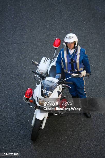 japanese policeman on 'coming of age day' on the street in yokohama - japan coming of age day 2019 stock pictures, royalty-free photos & images