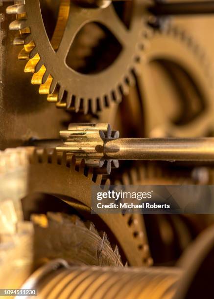 close up of cogs in long case clock - grandfather clock stock pictures, royalty-free photos & images