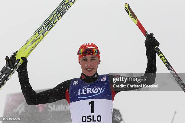 Eric Frenzel of Germany celebrates winning the gold medal following the Nordic Combined Individual 10KM Cross Country race during the FIS Nordic...