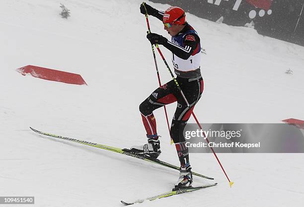 Eric Frenzel of Germany competes in the Nordic Combined Individual 10KM Cross Country race during the FIS Nordic World Ski Championships at...