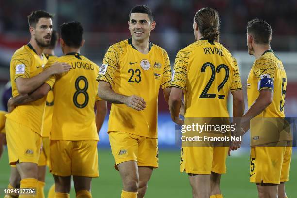 Tomas Rogic celebrates his sides second goal with Jackson Irvine and Mark Milligan during the AFC Asian Cup Group B match between Australia and Syria...