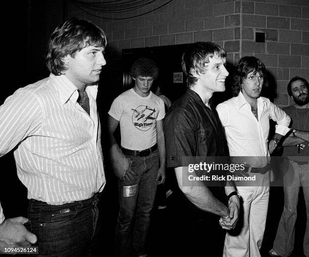 S Greg Lake, Carl Palmer and Keith Emerson of Emerson, Lake and Palmer backstage at The OMNI Coliseum June 23, 1977 in Atlanta Georgia