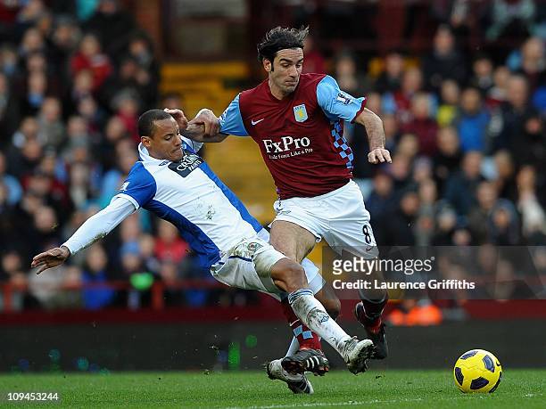 Robert Pires of Aston Villa battles for the ball with Jermaine Jones of Blackburn Rovers during the Barclays Premier League match between Aston Villa...