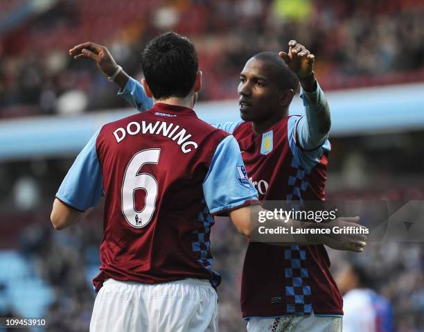 Ashley Young of Aston Villa celebrates his second goal with Stewart Downing during the Barclays Premier League match between Aston Villa and...