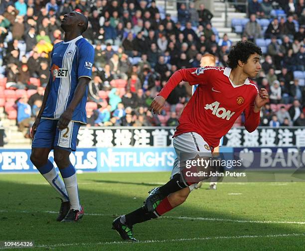 Fabio Da Silva of Manchester United celebrates scoring their fourth goal during the Barclays Premier League match between Wigan Athletic and...