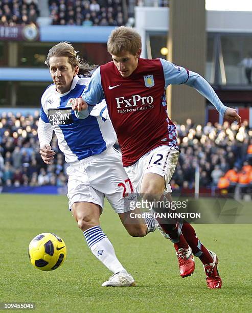 Blackburn Rovers Spanish defender Michel Salgado vies with Aston Villa's English midfielder Marc Albrighton during the English Premier League...