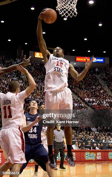 Kawhi Leonard of the San Diego State Aztecs rebounds the ball against the Brigham Young Cougars during the first half at Cox Arena on February 26,...