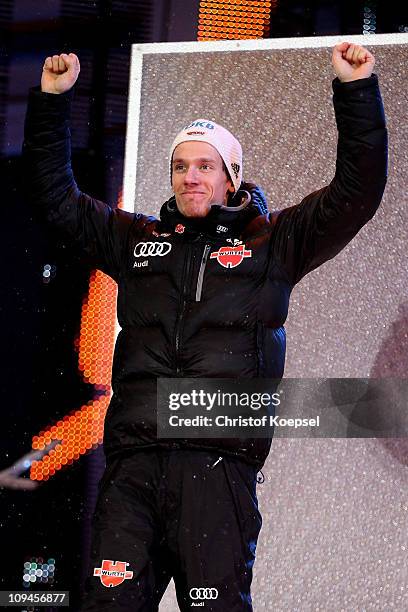 Tino Edelmann of Germany celebrates prior to receiving the silver medal won in the Nordic Combined Individual 10KM Cross Country race during the FIS...