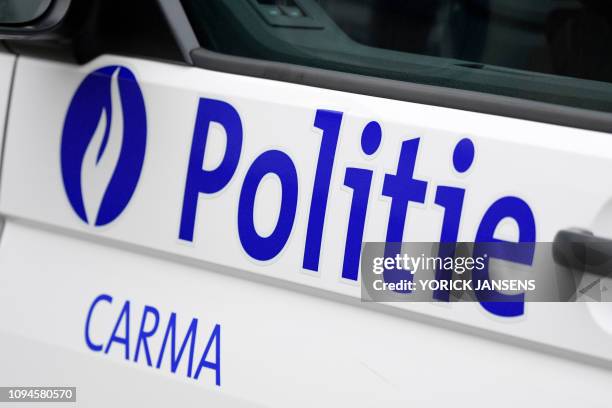 Illustration shows a close up on the logo of Poilitie in a car of Police an attempted robbery at the Argenta bank office in Bree, Tuesday 05 February...