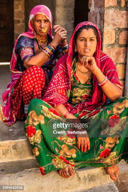indian woman with her daughter, bishnoi village - rajasthani women stock pictures, royalty-free photos & images