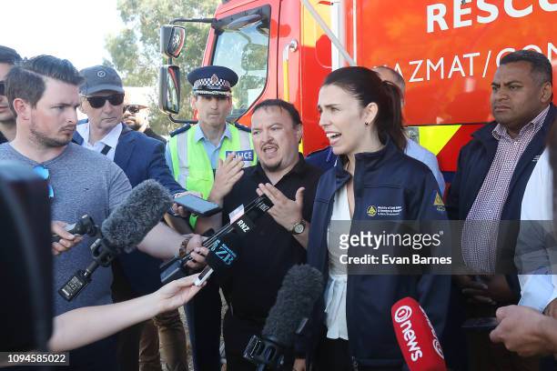 New Zealand Prime Minister Jacinda Ardern gives a media briefing at the Main Fire Command Centre as firefighters battle a blaze and 170 homes were...