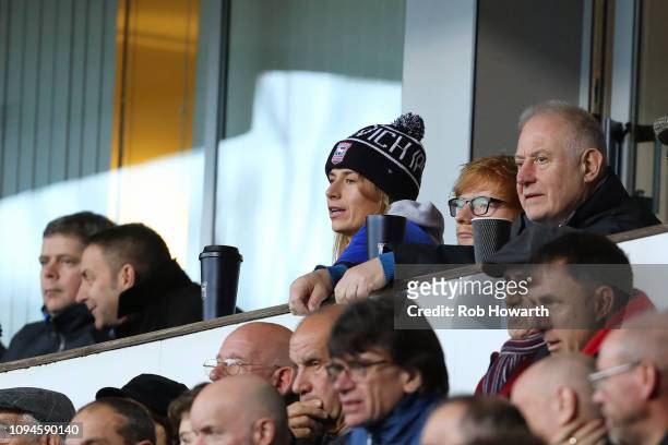 Musician Ed Sheeran watches his team, Ipswich Town with partner, Cherry Seaborn during the Sky Bet Championship match between Ipswich Town and...