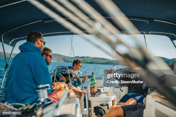 group of friends on yacht,croatia - yacht crew stock pictures, royalty-free photos & images