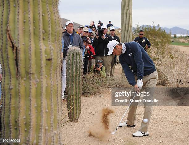 Martin Kaymer of Germany plays his approach shot on the 10th hole during the semifinal round of the Accenture Match Play Championship at the...