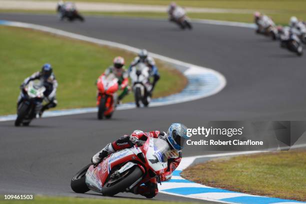 Carlos Checa of Spain riding the Althea Racing Ducati leads during race one of round one of the Superbike World Championship at Phillip Island Grand...