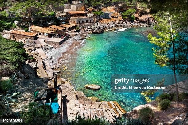 high angle view over the hidden bay of sa calobra - sierra de tramuntana stock pictures, royalty-free photos & images