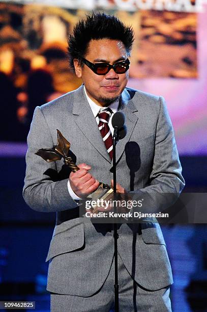 Cinematographer Matthew Libatique, winner of Best Cinematography for 'Black Swan,' accepts award onstage during the 2011 Film Independent Spirit...