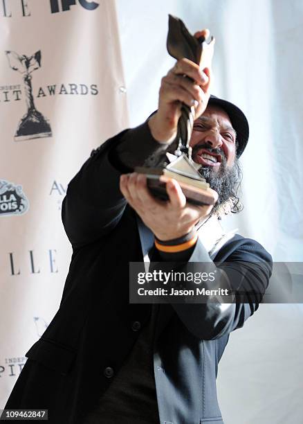 Artist/filmmaker Thierry Guetta, subject of Best Documentary winner 'Exit Through the Gift Shop,' poses in the press room during the 2011 Film...