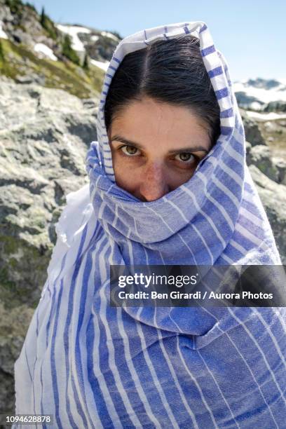 portrait of woman wrapped in towel - hurley stick stock pictures, royalty-free photos & images