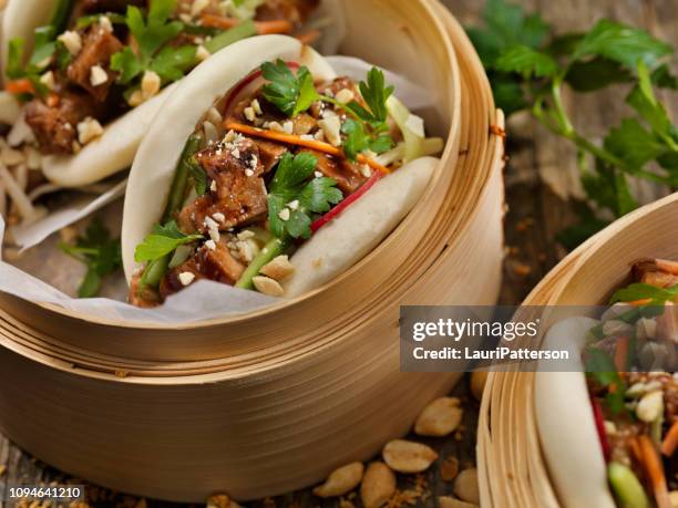 steamed bao buns with pulled pork - pork belly stock pictures, royalty-free photos & images