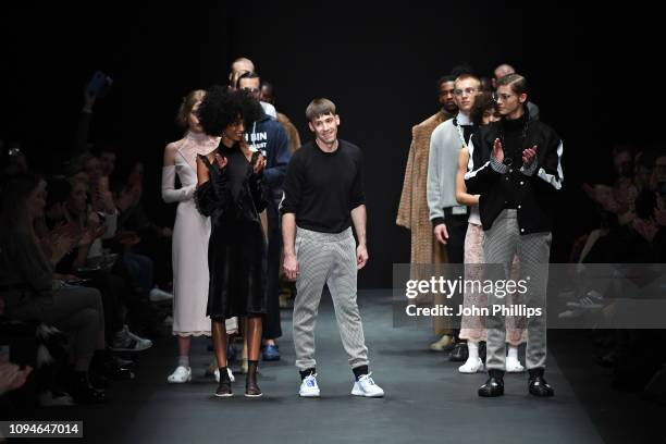 Designer Kilian Kerner acknowledges the applause of the audience aftwer the KXXK show during the Berlin Fashion Week Autumn/Winter 2019 at ewerk on...