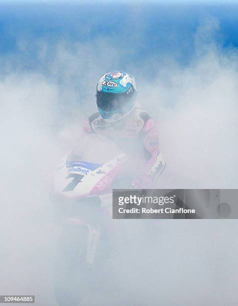 Carlos Checa of Spain riding the Althea Racing Ducati celebrates after winning race two of round one of the Superbike World Championship at Phillip...