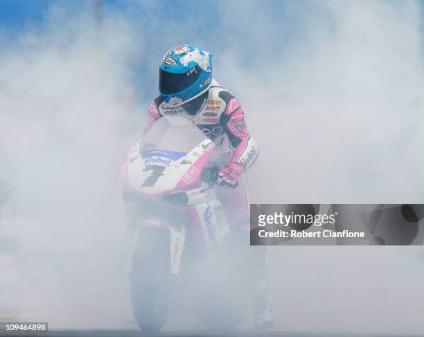 Carlos Checa of Spain riding the Althea Racing Ducati celebrates after winning race two of round one of the Superbike World Championship at Phillip...