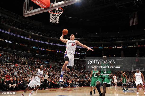 Blake Griffin of the Los Angeles Clippers goes up for a dunk ahead of Jeff Green of the Boston Celtics at Staples Center on February 26, 2011 in Los...