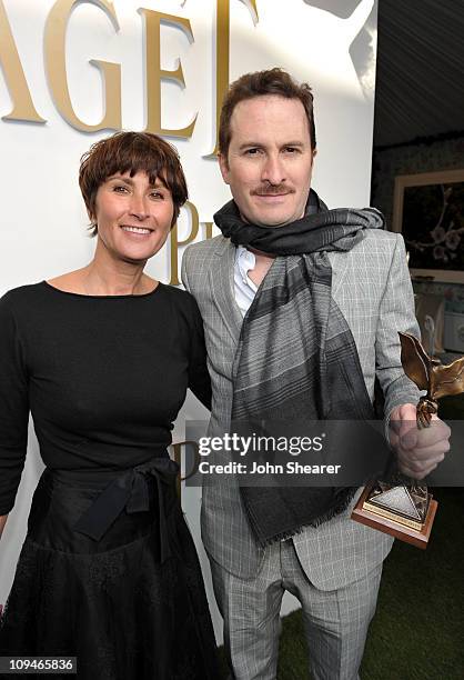 Piaget PR Manager Natacha Hertz and director Darren Aronofsky, winner of the Best Director award for 'Black Swan', in the Piaget Lounge at the 2011...