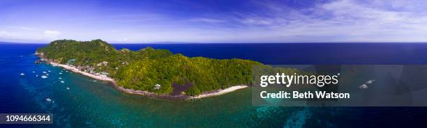 aerial view of apo island, philippines - list of islands by highest point stock pictures, royalty-free photos & images