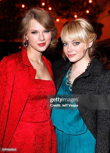 Musician Taylor Swift and Actress Emma Stone attend the Montblanc Cocktail Party co-hosted by Harvey and Bob Weinstein celebrating the Weinstein...