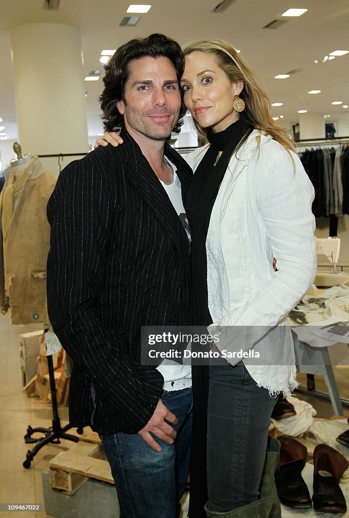 Actors Greg Lauren and Elizabeth Berkley attend Greg Lauren Launches