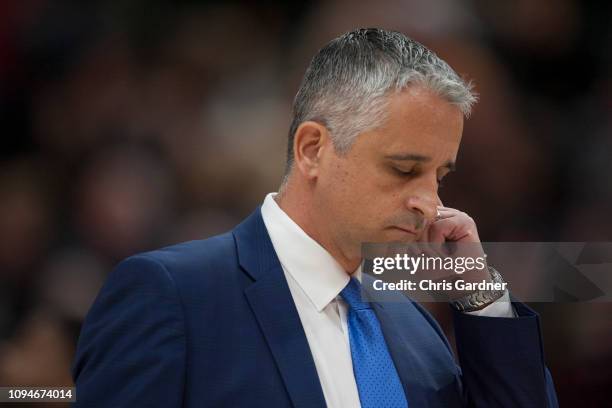 Igor Kokoskov head coach of the Phoenix Suns reacts as he walks back to the bench during a game against the Utah Jazz at the Vivint Smart Home Arena...