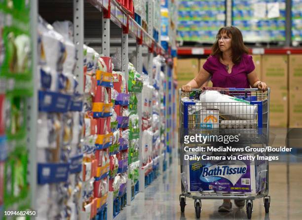 Nanette Ammon, of Longmont, walks the aisles during the grand opening of Sam's Club at Village at the Peaks Thursday morning.