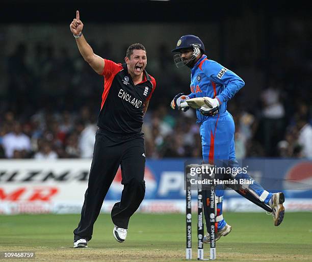 Tim Bresnan of England celebrates after taking the wicket of Harbhajan Singh of India during the 2011 ICC World Cup Group B match between India and...