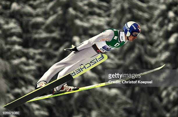 Adam Malysz of Poland competes in the Men's Ski Jumping Team HS106 competition during the FIS Nordic World Ski Championships at Holmenkollen on...