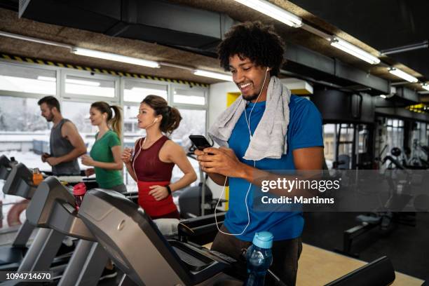 Phone Exercise Man Headphone Gym Photos and Premium High Res Pictures - Getty Images