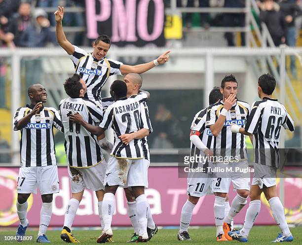 Alexis Sanchez of Udinese celebrates with team-mates after scoring his team's fifth goal during the Serie A match between US Citta di Palermo and...