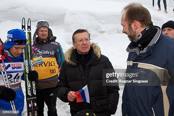 Russian First Deputy Prime Minister Viktor Zubkov talks with Norwegian Minister of Trade and Industry Trond Giske and bronze medalist Ilia Chernousov...